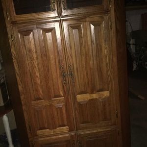 large solid wood entertainment center